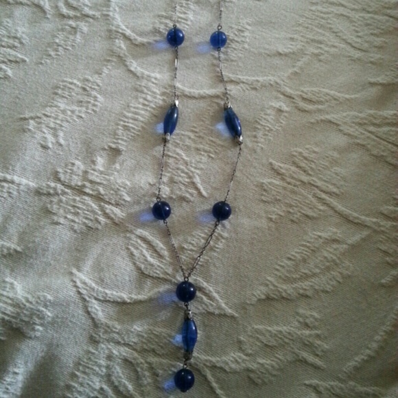 Sterling necklace with blue glass beads.
