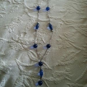 Sterling necklace with blue glass beads.
