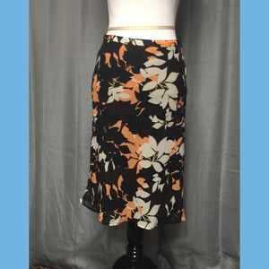 Knee-length flared skirt.