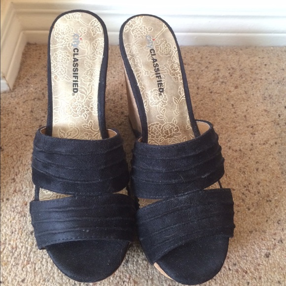 Bundle of two wedged heels.