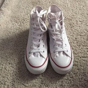 Chuck Taylor high top sneakers