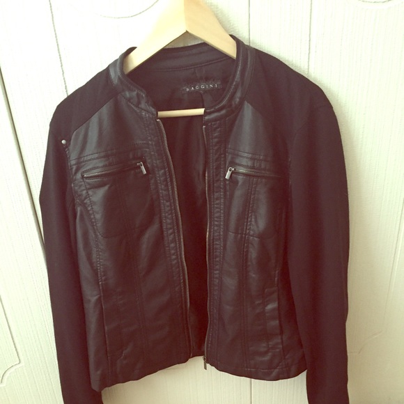 Black faux leather and polyester jacket. Size L.