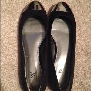 Black flats with silver cap toes
