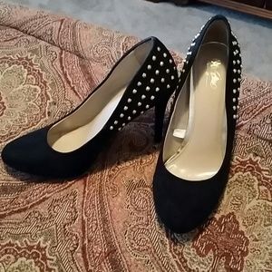 Black and gold heel