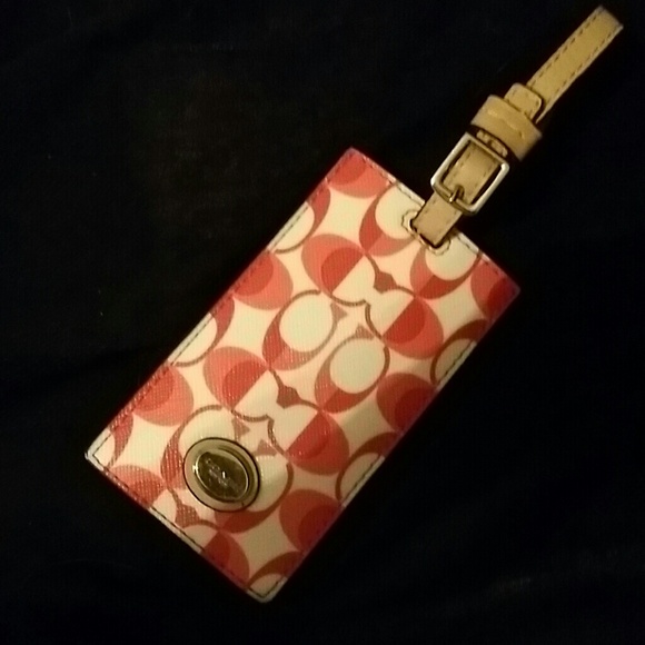 COACH LUGGAGE TAG!! I used it to hold business crd