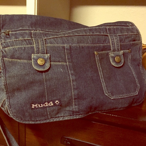 Jean bag with straps and pockets