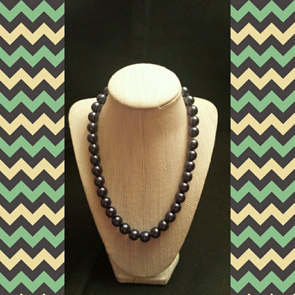 Just like new Navy blue strand of pearls.