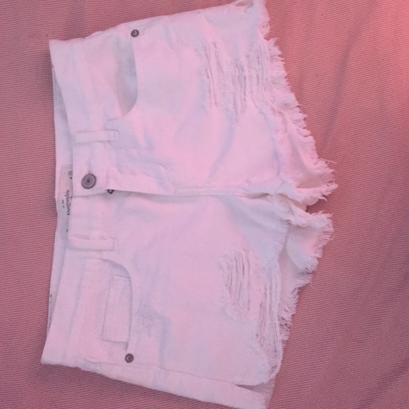 white distressed Jean shorts