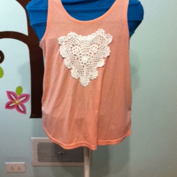 Peach shirt with white lace heart