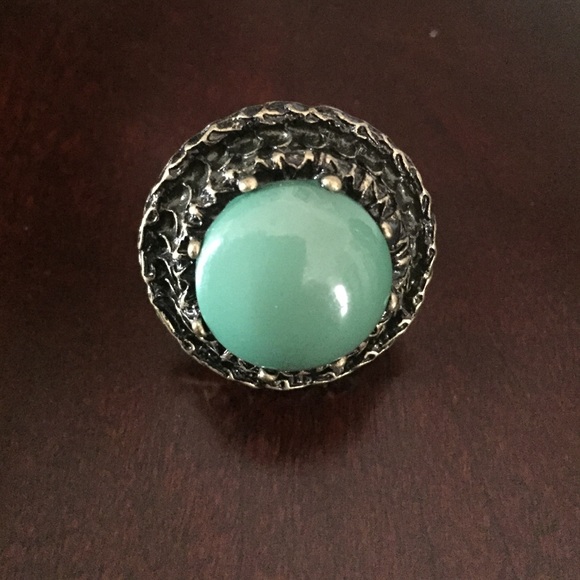 Large green stoned with antiqued gold adj band