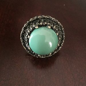 Large green stoned with antiqued gold adj band