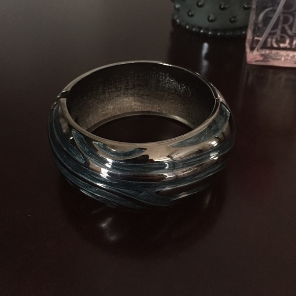 Blue and silver bangle. Clicks open not slipon New