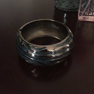 Blue and silver bangle. Clicks open not slipon New