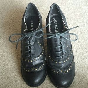 Black and gold booties.