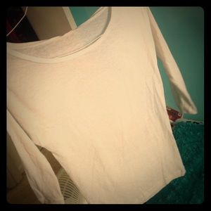 Plain white 3/4 length shirt.