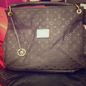 SOLD....Black Purse With Gold Accents