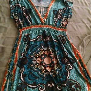 Teal, orange, baby doll dress.