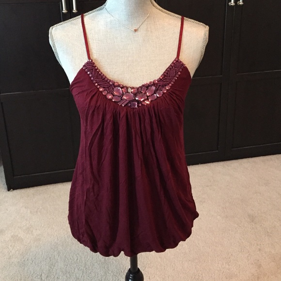 Maroon embellished top.