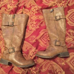 Brown boots. Inside ankle zipper