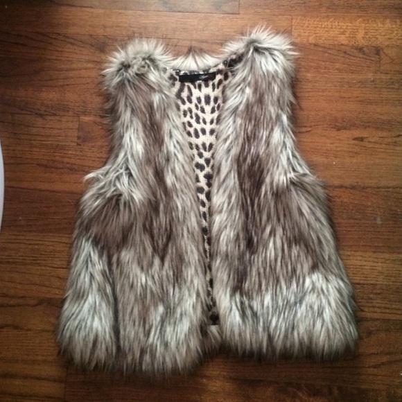 Black, white and grey fur vest