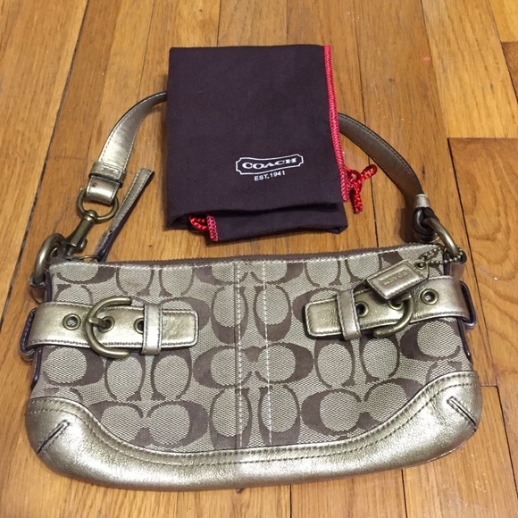 Gold coach purse