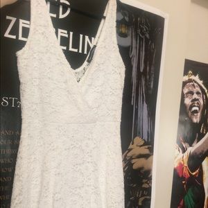 Adorable white bohemian style mini dress!