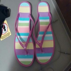 Coach rubber flip flops size 9.