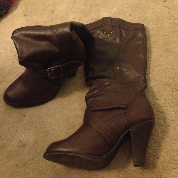 Tall brown high heeled boots