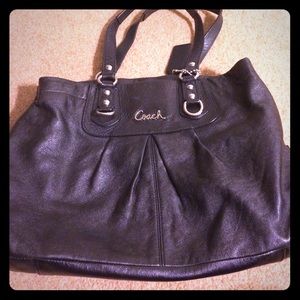 Black with purple inside authentic Coach Bag