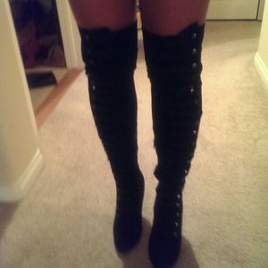 Thigh high laced up boots