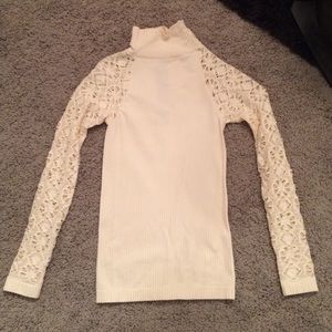 Free People cut out sleeved cream turtle neck top