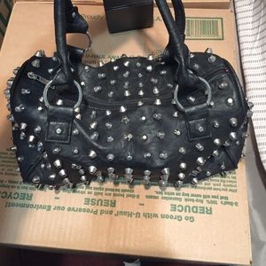 Black studded handbag