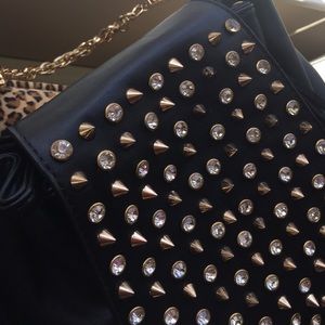 Cross body bag with pointy studs