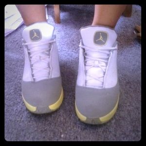 Grey and yellow jordans