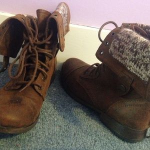 Brown combat boots.