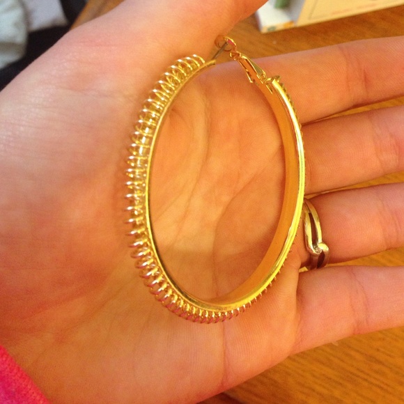 Gold hoops with detailing