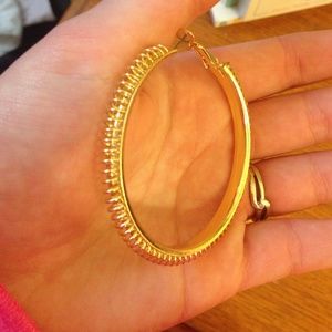 Gold hoops with detailing