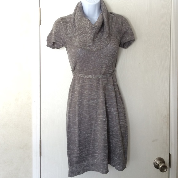 Tight fit grey dress. Turtle neck type neck.