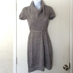 Tight fit grey dress. Turtle neck type neck.