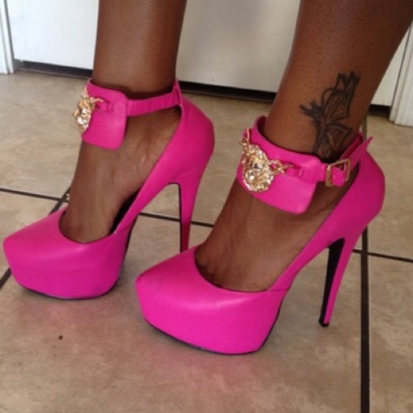 Hot pink lion head pumps