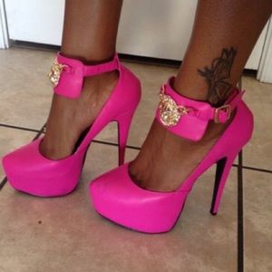 Hot pink lion head pumps