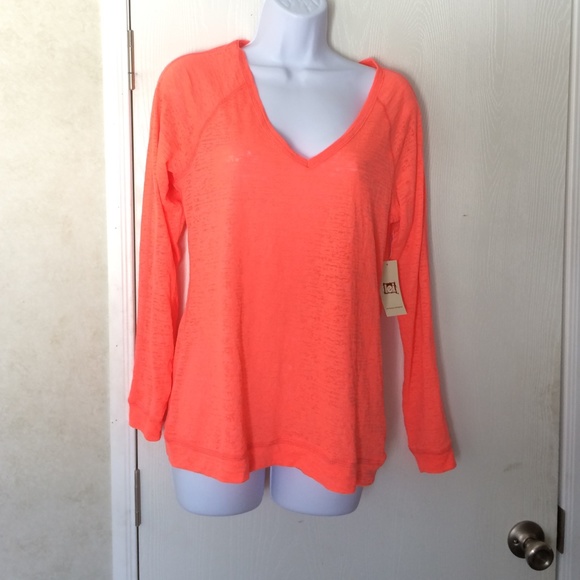 Thin neon orange long sleeve.