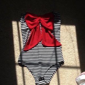 Cute black & white stripped bodysuit w/red bow!