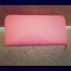 Bright pink wallet