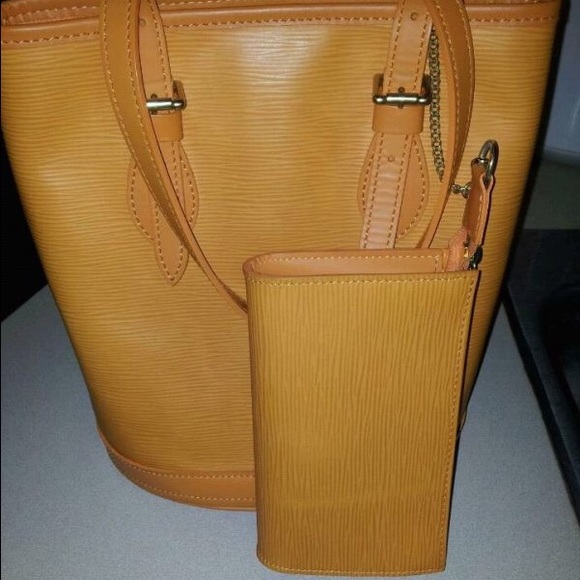 Louis Vuitton bucket bag.