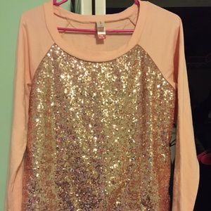 Sparkly pink sweater.