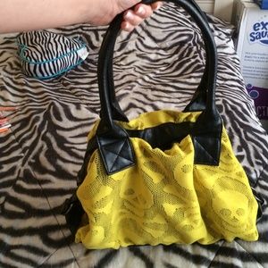 Yellow skull purse.
