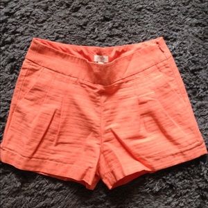 J. Crew orange pleated shorts