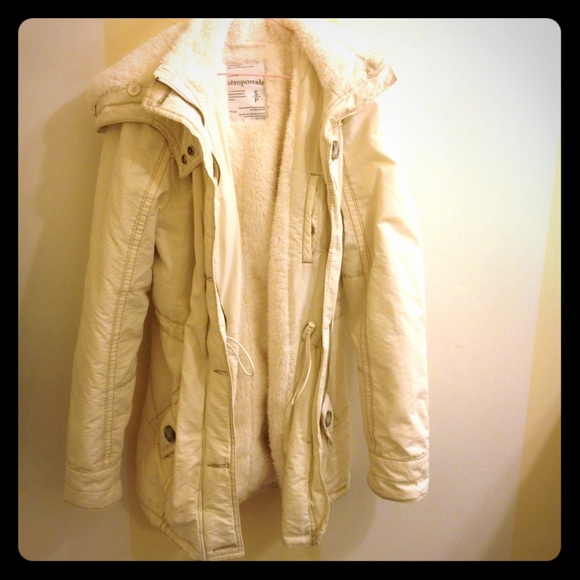 Cozy with removable fake fur on the hood.