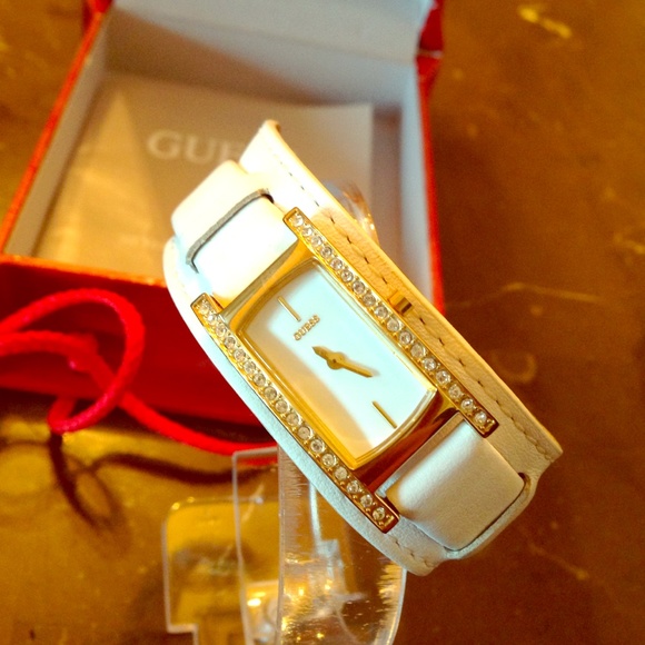 White leather Guess watch.